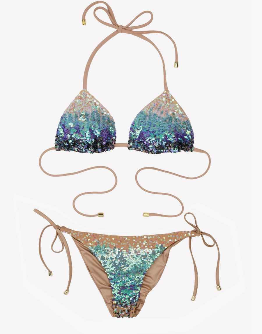 Shop online fast shipping Beach bunny swimwear ariel ombre sequin bikini designed for resort luxury holidays boasting its shiny sparkle glitter shimmer on the embellished sliding triangle bikini top with lavish sequin embellishments in mermaid ombre paired with skimpy ruched tiny itsy bitsy bikinis bottoms that deliver cheeky coverage adjustable tie sides for customizable fit ideal for exotic high end designer beach looks sparkle bikini itsy bitsy bikinis elegant swimsuits for glamorous pool parties