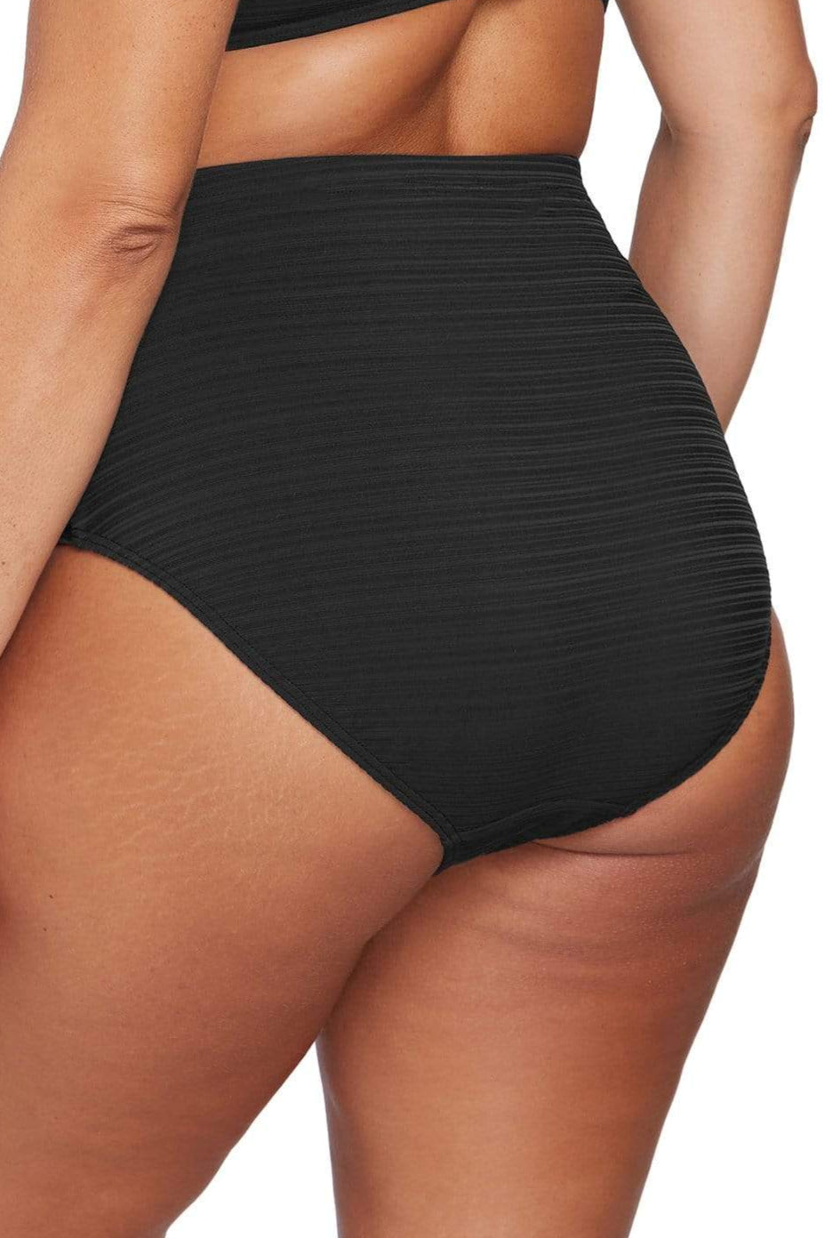 A plus size traveler from Miami USA is wearing a Aria Botticelli High Waisted Swim Bottoms Plus Size Artesands from Sun Vixen Swimwear that smooths her belly pooch and enhances her curvy silhouette for a beach trip. She likes premium slimming swimsuits with designer quality lift her sagging bust. Sun Vixen Swimwear attracts curvy luxury shoppers from Montreal, Calgary, San Diego, Washington DC, and Houston searching for high quality plus size bathing suits and tummy control, best womens swimsuits online