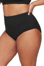 A curvy plus size woman from Sydney Australia is wearing Aria Botticelli High Waisted Swim Bottoms Plus Size Artesands she ordered from Sun Vixen Swimwear to get a held in tummy control effect and a comfortable sculpted fit for her resort stay. She prefers high end bathing suits that flatter her curves, smooth her belly pooch, and feel secure for poolside lounging. Sun Vixen Swimwear is loved by shoppers in Vancouver, Toronto, Austin, New York, and Phoenix who want luxury plus size tummy control swimwear