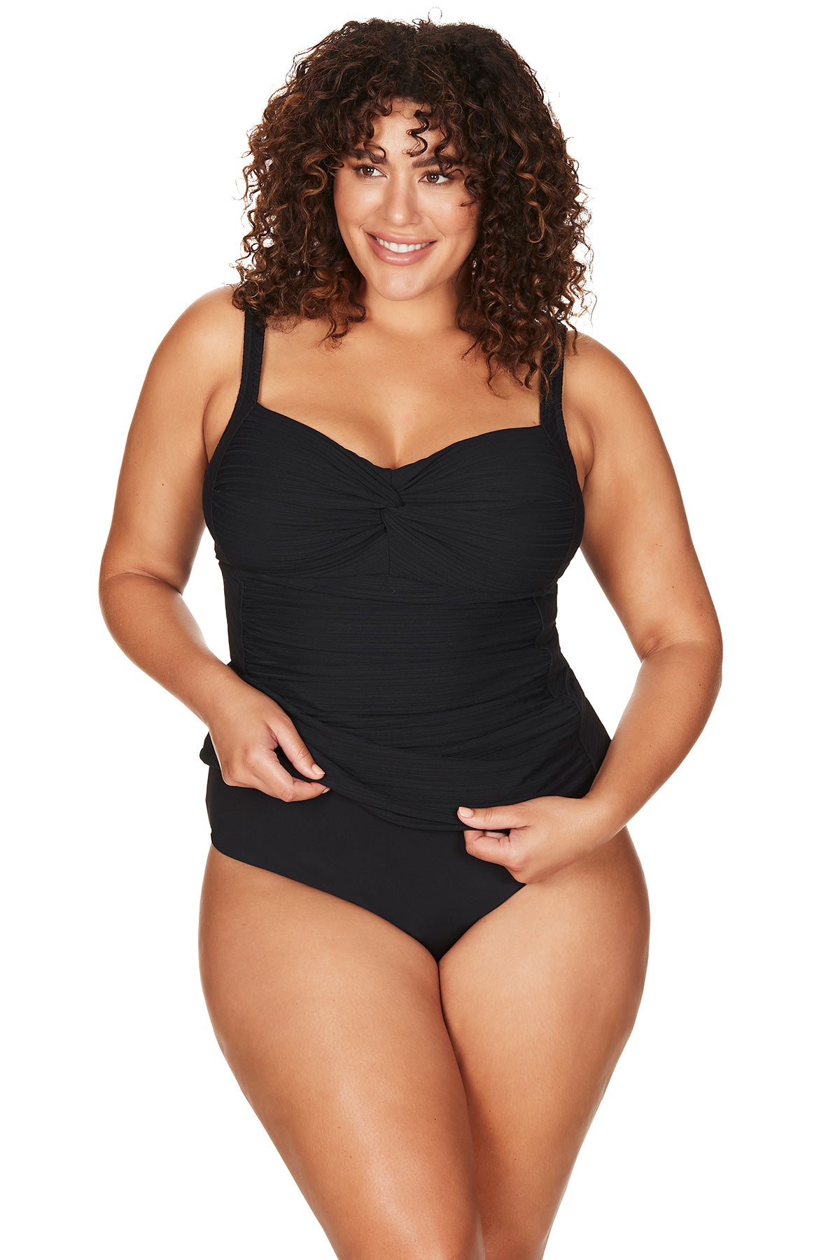 A plus size woman from San Francisco USA is wearing a Aria Botticelli Slimming Tankini Swimsuit Set Plus Size Artesands to flatten her belly pooch she bought online from sun vixen swimwear a luxury boutique website for best tummy control swimsuits, slimming womens bathing suits. She is a luxury shopper who like good quality bathing suits for her beach trips. This top rated swimwear store has 5 star ratings. Customers from Toronto, Montreal, New York, Dallas, Washington love it for sexy slimming tankini tops