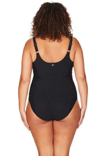 A curvy woman from Vancouver is spending the week in Barbados, relaxing at a luxury resort along Carlisle Bay while wearing the Plus Size Aria Giotta Artesands premium underwire swimsuit, chosen for its strong bust support, high quality tummy control shaping, and designer craftsmanship that enhances her natural curves. She loves how the swimsuit’s sleek sculpting structure smooths her abdomen, defines her waist, and gives her an elegant slim figure that looks sophisticated and sexy for infinity resort pool