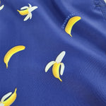 Banana Swim Trunks Island Haze Tropical print Mens Shorts cool print funny shorts navy blue 5 inch inseam elastic waist drawstring front inner mesh lining side pockets back velcro close pocket quick dry soft fabric unique lucky banana swim short lively print vacation beach vibe vacation hilarious couples trip joke ridiculous guys blue navy unusual popular best mens swim good price ships fast buy canada usa life of the party goofy travel online shopping enthusiast beauty maven gym goer travels often sexy 