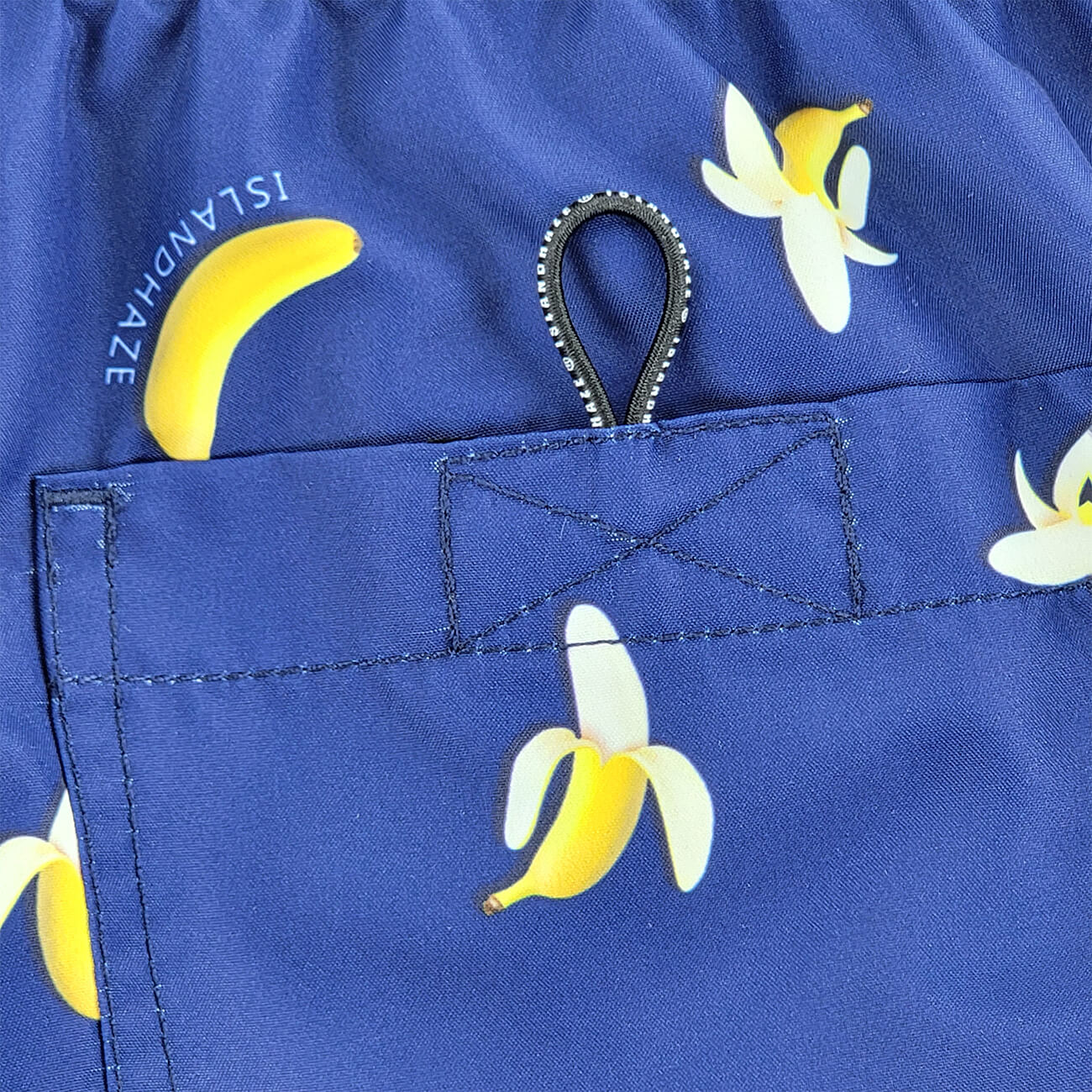 Banana Swim Trunks Island Haze Tropical print Mens Shorts cool print funny shorts navy blue 5 inch inseam elastic waist drawstring front inner mesh lining side pockets back velcro close pocket quick dry soft fabric unique lucky banana swim short lively print vacation beach vibe vacation hilarious couples trip joke ridiculous guys blue navy unusual popular best mens swim good price ships fast buy canada usa life of the party clown travel online shopping enthusiast beauty maven gym goer travels often sexy 