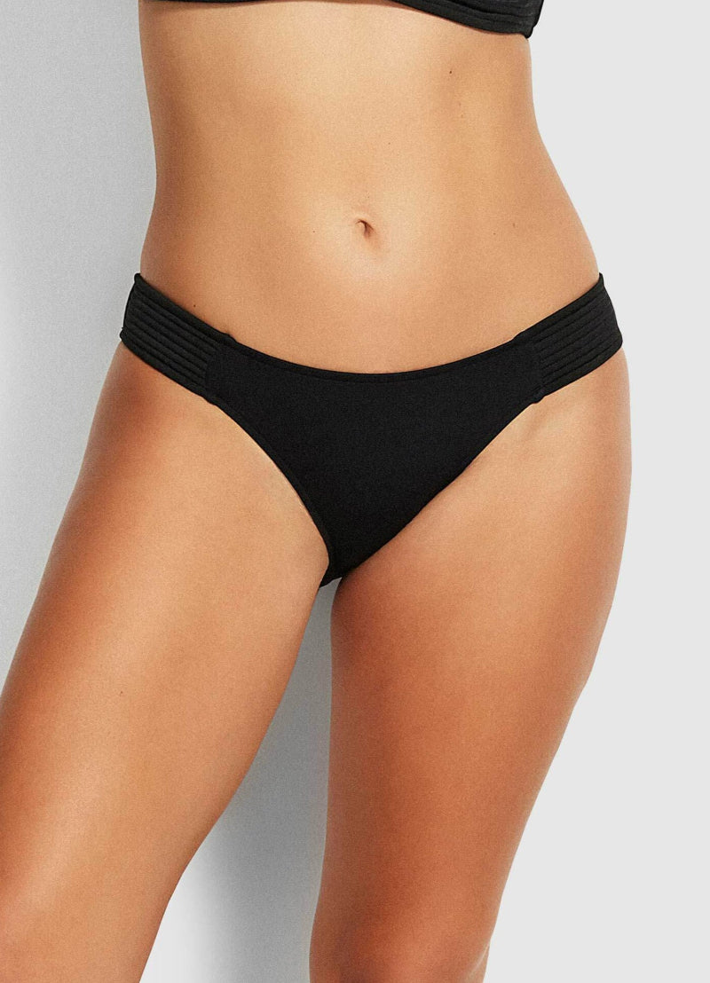 Black Bikini Bottoms Full Coverage Seafolly quilted sides low rise classy sophisticated high end designer bikini bottoms highly rated 5/5 by Stacy from Illinois for fit style and comfort good quality fabric top quality brand name Stacy is a fashionista online shopping enthusiast who purchases luxury swimwear and fashion online frequently travels to beach destinations and resort hotels for vacation regularly bottoms side detail unique edgy fancy elegant mix & match with any bikini top for multiple styles lux