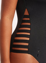 Black high neck one piece swimsuit sustainable seafolly edgy cutout sides sexy rocker glamorous sophisticated unique fancy covers upper chest for sensitive skin minimizes sun exposure full coverage bottoms zip back high quality luxury fabric designer made long zipper pull easy on/off outdoor swimsuit water cute pretty elegant unusual Donna rated 5/5 eco friendly fabric beach traveller resort beauty maven frequently buys online fashionista shopping enthusiast recently purchased luxury beach fashion for trip 