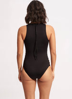 Black high neck one piece swimsuit sustainable seafolly edgy cutout sides sexy rocker glamorous sophisticated unique fancy covers upper chest for sensitive skin minimizes sun exposure full coverage bottoms zip back high quality luxury fabric designer made extra long zipper pull for easy on/off great paddle board swimsuit cute pretty elegant unusual purchased by Monique beach travel lover vacations resort frequently purchases online fashion goods shopping enthusiast recently purchased luxury swimwear coverup