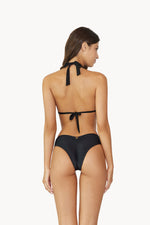 Popular Instagram influencer Miami wears Gold Beaded Macrame Bikini Top PQ Swim midnight beaded brynn halter Midnight Basic Ruched Bottoms teeny on beach vacation. She purchased designer triangle bikini top, good quality black bikinis, resort swimsuits, upscale elegant beach cover ups from sun vixen swimwear top quality swimwear store 5 star reviews on google. It's best quality swimwear retailer for luxury shopper who purchase online beautiful swimsuits, hottest bikinis, yacht swimwear luxury cruise bikinis