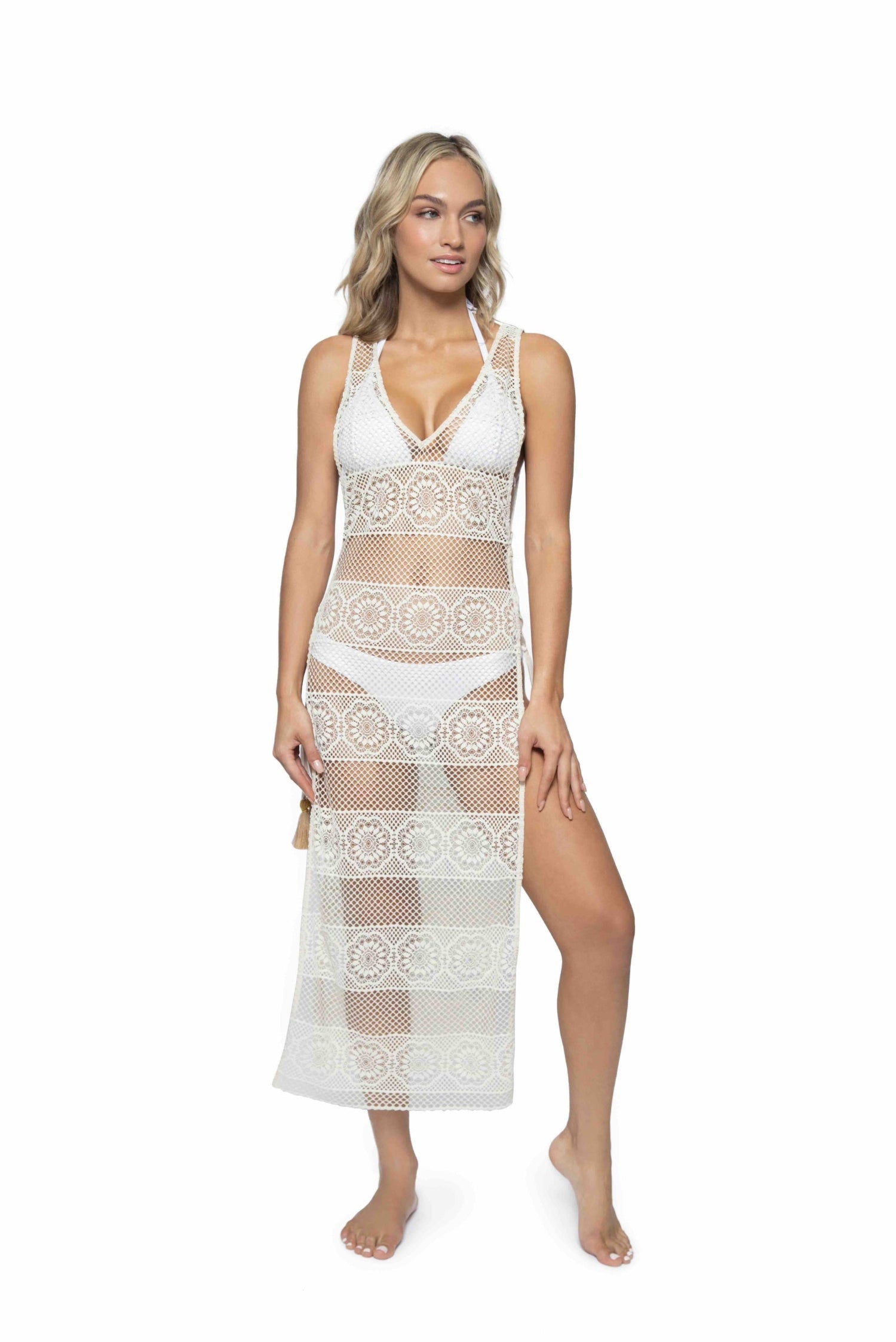 Buy Joy white lace beach cover up pq swim stylish sophisticated luxury best quality dallas fort worth texas USA unique hot luxe swimsuits online.  A fashionista on her beach vacation purchased a luxury white beach cover up from sun vixen swimwear. This is the top rated website for woman who have a high end lifestyle. Ths classy woman is wearing a high end bikini with sexy lace beach cover up which she bought from this top quality website on google. Designer beach cover ups, sexy lace bikini cover ups online