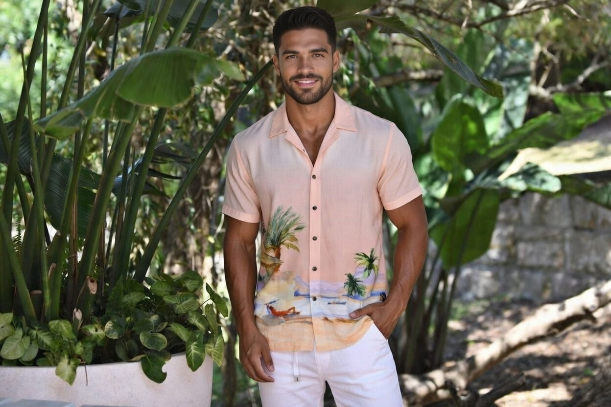 A stylish man wears a designer Hawaiian beach shirt from Sun Vixen Swimwear on a tropical vacation. This mens designer swimwear store offers the best luxury beach shirts, featuring floral beach shirts, designer mens beachwear, and premium resort shirts, perfect for a smart resort  beach look. This mens designer swimwear store features the best luxury beach shirts, cool beach shirts, sustainable mens beachwear, and tropical shirts, stylish resort shirts, and stylish resort shirts, high end designer beachwear