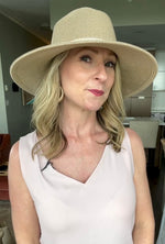 Fedora Beach Hat Collapsible | Seafolly packable adjustable fit one size fits all neutral shade lightweight braided accents tassels gold shimmer cute stylish celebrity look foldable travel hat gold shimmer sparkle braided ties hidden size adjustable inner drawstring customize to fit chic polyester sun hat brimmed fedora beach hat sophisticated light beige tan pretty glamorous fancy summer hat goes with everything vacation hat keeps shape springs back suitcase hat fits everyone hidden inner drawstring womens