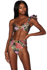 a fashionista from Toronto Canada is looking stunning wearing a Fuschia Orchid Rita Top Beach Riot Ruffle Shoulder Swimsuit Belted Bikini Bottoms Tropical Beach Riot Fuschia Orchid Halle Bottoms on her beach vacation in Mallorca Islands. She is famous instagram icon that shops frequently on sun vixen swimwear to look on trend on her luxury beach vacations. She also purchased for classy one shoulder bikini top, high end gucci  inspired bathing suits, high waist bikini bottoms for her 5 star resort holiday