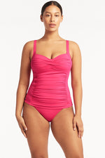 Hot Pink Tankini Top Sustainable Sea Level Australia Twist Front Multifit Singlet Top eco friendly swim ladies designer brand high quality sophisticated belly flattening adjustable straps expensive sexy tankini vacation swimsuits site mom stylish bathing suit elegant chic tummy toning tank top swimsuit fancy best swimsuit hides belly pooch luxury canada website getaway ruching fashionista online shopping enthusiast travel buff bright fun bougie boutique sale clearance fashion bathing suits womens cute luxe