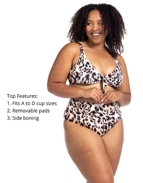 A woman from Dallas is on her Bali trip in her Artesands saphare chagall leopard bikini bottoms loving the tummy control mid rise bikini bottoms that smoothes and sculpts her curves. This high end plus size woman shops Sun Vixen Swimwear online boutique for premium plus size swimsuits, stylish animal print bikinis, designer womens swimwear trusted in Canada USA in cities Toronto Chicago Edmonton New York Seattle Mississauga for luxury flattering swimsuits and best swimsuits for bigger sagging bust support