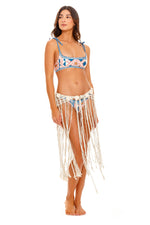 Macrame Beach Cover Up | Agua Bendita shop online Alaia Tout glamorous handmade designer beachwear white fringe sarong skirt crochet floral stylish cute expensive Macrame Beach Cover Up Agua Bendita Alaia Tout sexiest hottest luxury resort wear best quality classy beach outfit designer handmade macrame swimsuit cover up buy top brands swimwear online handmade crochet flowers netted look long tassels fishnet seethrough glamorous unique high end natural fiber neutral color hand weaved artisan made mermaid lux