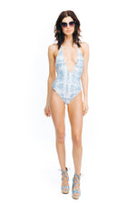 One Piece Swimsuit Kyra Reversible Arrow & Eve Blue and white tie dye reverses to solid white lux buttery soft high end fabric deep v plunge neckline cut out sides full coverage bottoms adjustable halter neck ruching detail at the back festival body suit two looks in one goes with jean shorts skirts pants jeans all season wearable open back online clearance sale swimwear designer made in usa online shopping enthusiast purchased recently purchases luxury goods often beauty maven travel buff canada usa size M