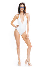 One Piece Swimsuit Kyra Reversible Arrow & Eve Blue and white tie dye reverses to solid white lux buttery soft high end fabric deep v plunge neckline cut out sides full coverage bottoms adjustable halter neck ruching detail at the back festival body suit two looks in one goes with jean shorts skirts pants jeans all season wearable open back online clearance sale swimwear designer made in usa online shopping enthusiast purchased recently purchases luxury goods often beauty maven travel buff canada coachella 