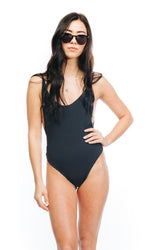 One Piece Swimsuit Reversible Charley Arrow & Eve skin tone tribal print one side solid black side thong bottoms low cut v neck cutout sides beige geometric print edgy body suit festival swimsuit versatile one piece carry on packable many outfits buttery soft fabric made in usa adjustable shoulder straps open back sexiest swimsuit online shopping enthusiast purchases often bargain hunter travel buff beauty maven clearance swimsuits good deal best price designer swimsuits reputable website canada usa 