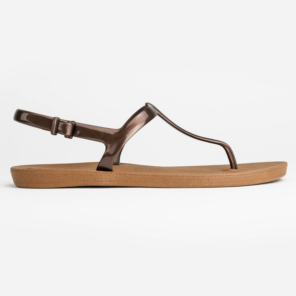 Sandals Journey designed by Third Oak metallic finish vegan cruelty free sturdy design made with bio based material 45% soy by weight 100% recyclable made in the USA eco friendly flats flip flops stylish shiny cute adjustable heel strap vacation good quality american made eco safe environmentally friendly best flats vacation open toe thongs good quality buy online clearance sale neutral color copper bronze brown beach shoes dressy cute pretty elegant goes with shorts dress up or down good carry on stylish 