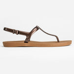 Sandals Journey designed by Third Oak metallic finish vegan cruelty free sturdy design made with bio based material 45% soy by weight 100% recyclable made in the USA eco friendly flats flip flops stylish shiny cute adjustable heel strap vacation good quality american made eco safe environmentally friendly best flats vacation open toe thongs good quality buy online clearance sale neutral color copper bronze brown beach shoes dressy cute pretty elegant goes with shorts dress up or down good carry on stylish 
