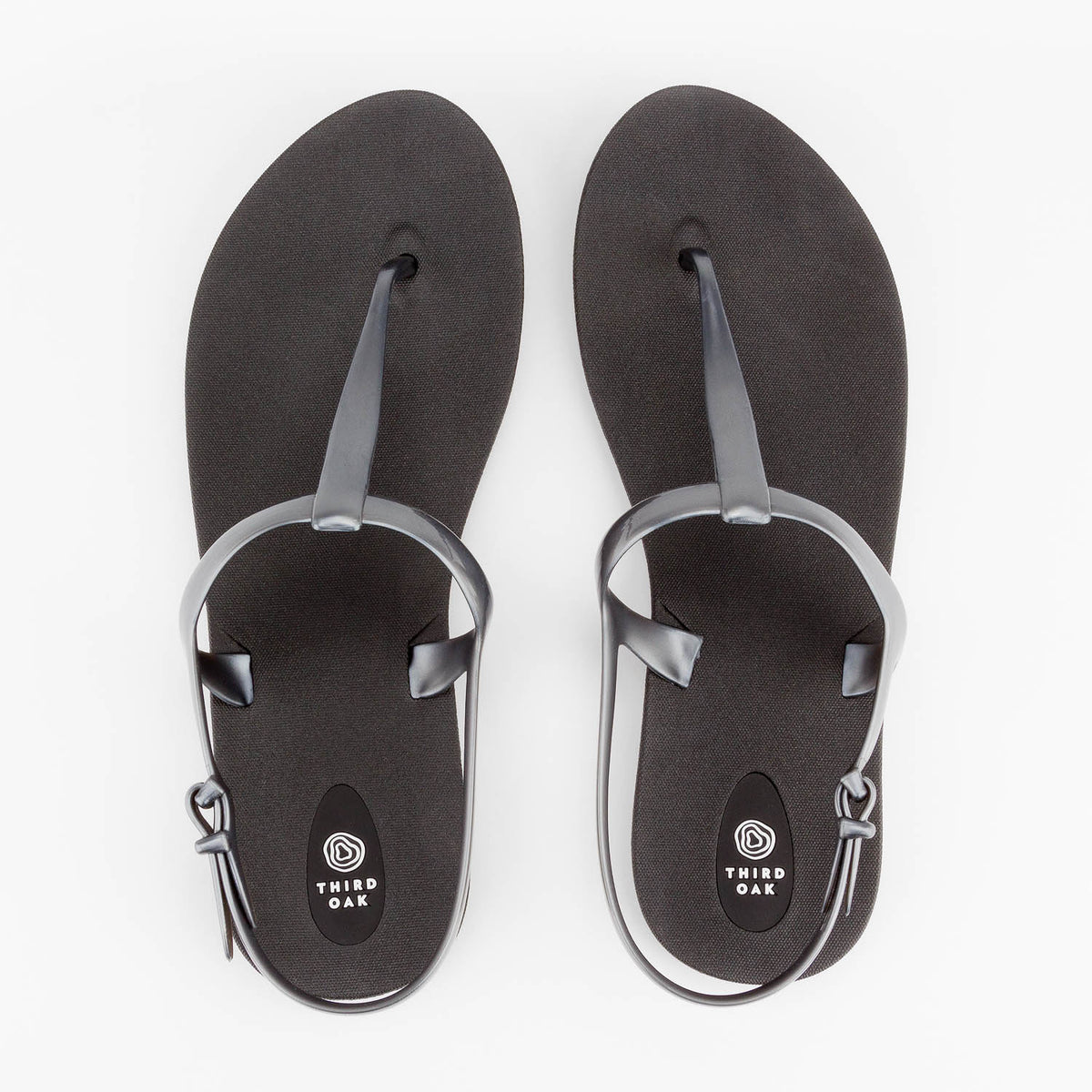 Sandals Journey designed by Third Oak metallic finish vegan cruelty free sturdy design made with bio based material 45% soy by weight 100% recyclable made in the USA eco friendly flats flip flops stylish shiny cute adjustable heel strap vacation good quality american made eco safe environmentally friendly best flats vacation open toe thongs good quality buy online clearance sale best materials durable good travel beach shoes dressy cute pretty elegant goes with dresses shorts dress up or down good carry on