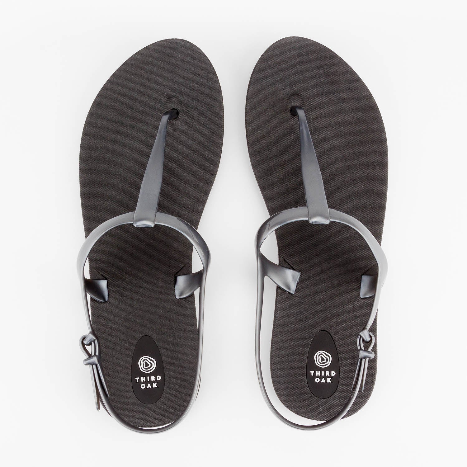 Sandals Journey designed by Third Oak metallic finish vegan cruelty free sturdy design made with bio based material 45% soy by weight 100% recyclable made in the USA eco friendly flats flip flops stylish shiny cute adjustable heel strap vacation good quality american made eco safe environmentally friendly best flats vacation open toe thongs good quality buy online clearance sale best materials durable good travel beach shoes dressy cute pretty elegant goes with dresses shorts dress up or down good carry on