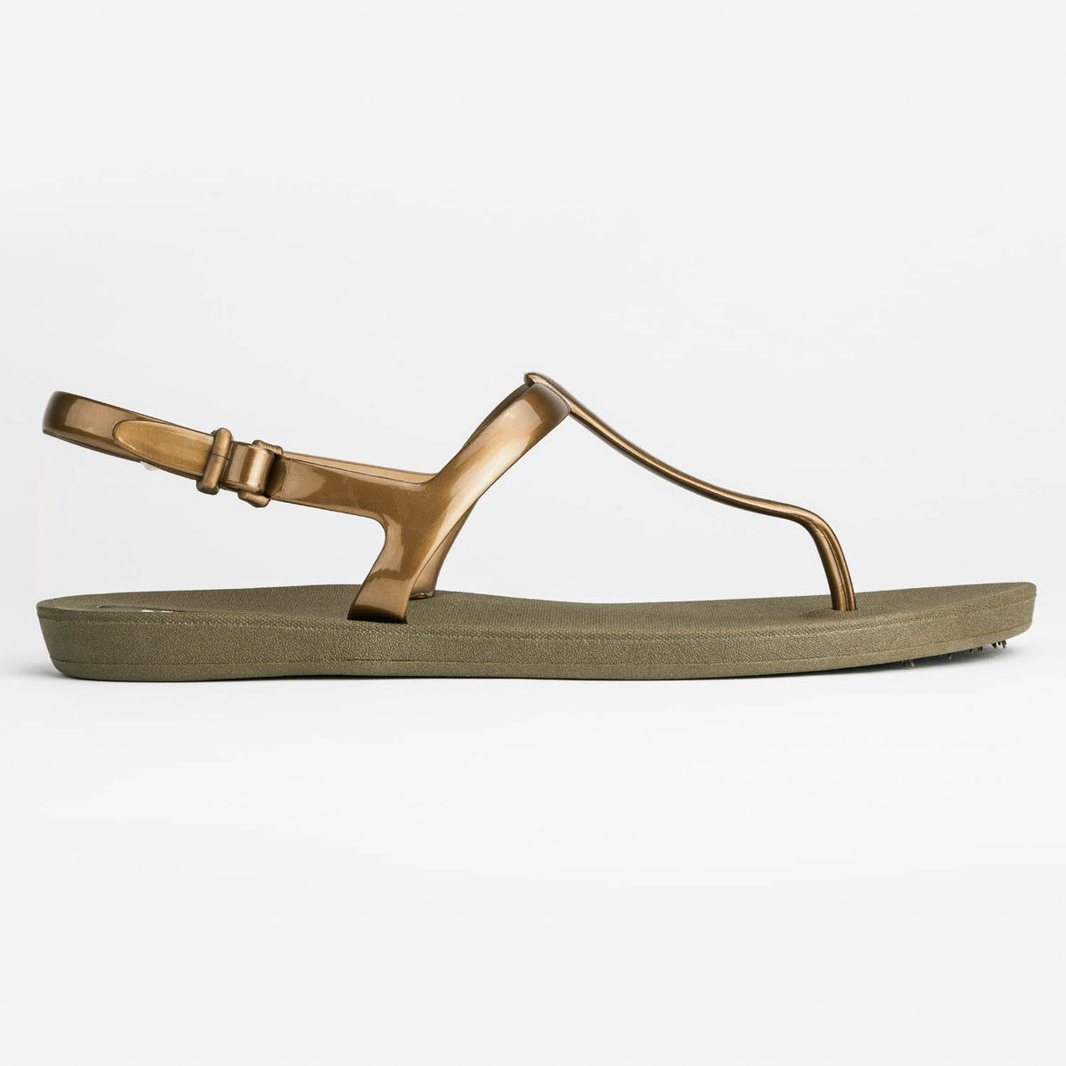 Sandals Journey designed by Third Oak metallic finish vegan cruelty free sturdy design made with bio based material 45% soy by weight 100% recyclable made in the USA eco friendly flats flip flops stylish shiny cute adjustable heel strap vacation good quality american made eco safe environmentally friendly best flats vacation open toe thongs good quality buy online clearance sale neutral color gold green beach shoes dressy cute pretty elegant versatile dress up or down good carry on stylish shimmer elegant 
