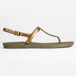 Sandals Journey designed by Third Oak metallic finish vegan cruelty free sturdy design made with bio based material 45% soy by weight 100% recyclable made in the USA eco friendly flats flip flops stylish shiny cute adjustable heel strap vacation good quality american made eco safe environmentally friendly best flats vacation open toe thongs good quality buy online clearance sale neutral color gold green beach shoes dressy cute pretty elegant versatile dress up or down good carry on stylish shimmer elegant 