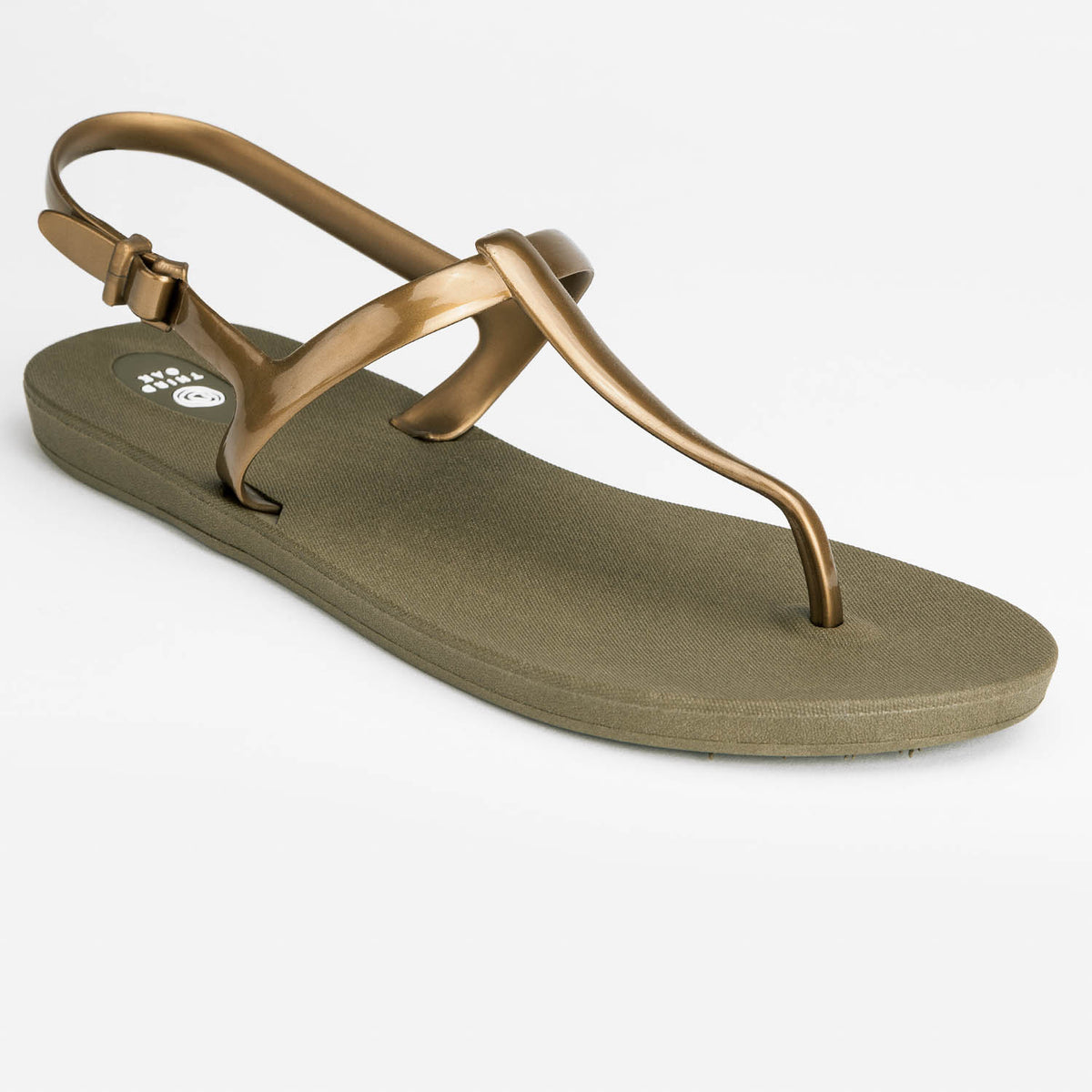 Sandals Journey designed by Third Oak metallic finish vegan cruelty free sturdy design made with bio based material 45% soy by weight 100% recyclable made in the USA eco friendly flats flip flops stylish shiny cute adjustable heel strap vacation good quality american made eco safe environmentally friendly best flats vacation open toe thongs good quality buy online clearance sale neutral color gold green beach shoes dressy cute pretty elegant goes with shorts dress up or down good carry on stylish shimmer