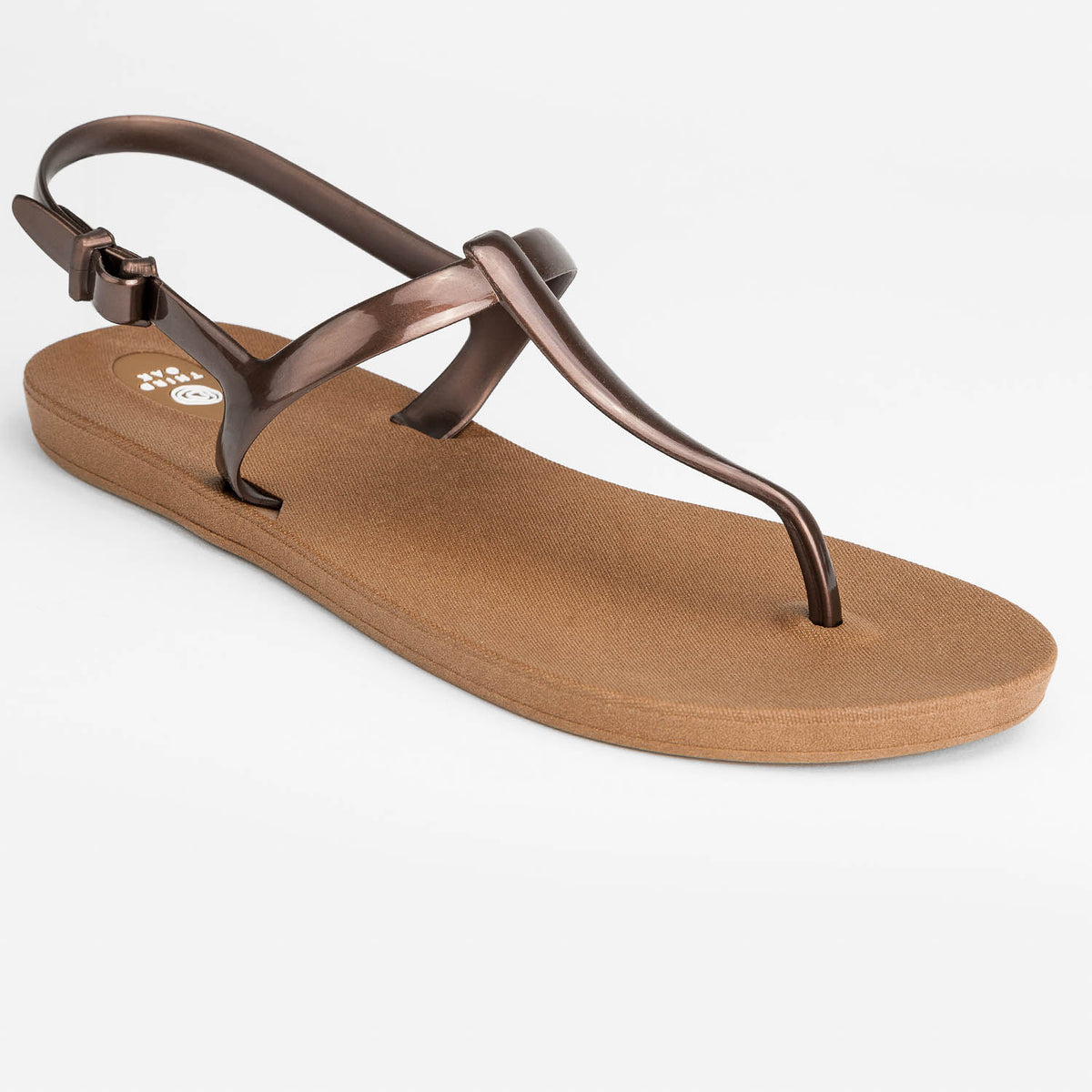 Sandals Journey designed by Third Oak metallic finish vegan cruelty free sturdy design made with bio based material 45% soy by weight 100% recyclable made in the USA eco friendly flats flip flops stylish shiny cute adjustable heel strap vacation good quality american made eco safe environmentally friendly best flats vacation open toe thongs good quality buy online clearance sale neutral color copper bronze brown beach shoes dressy cute pretty elegant goes with shorts dress up or down good carry on stylish 