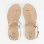 Sandals Journey designed by Third Oak metallic finish vegan cruelty free sturdy design made with bio based material 45% soy by weight 100% recyclable made in the USA eco friendly flats flip flops stylish shiny cute adjustable heel strap vacation good quality american made eco safe environmentally friendly best flats vacation open toe thongs good quality buy online clearance sale neutral color durable beige gold beach shoes dressy cute pretty elegant goes with shorts dress up or down good carry on stylish 