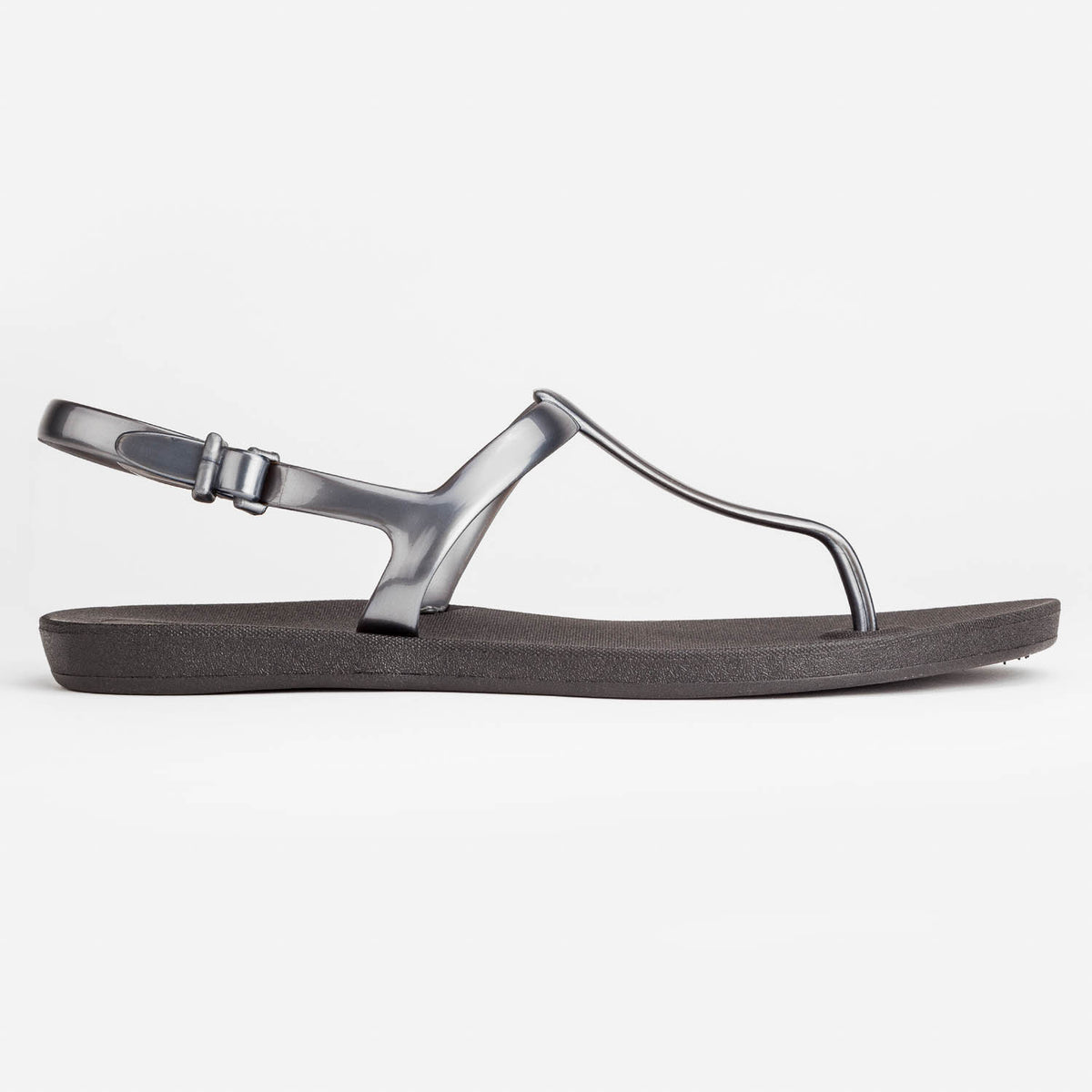 Sandals Journey designed by Third Oak metallic finish vegan cruelty free sturdy design made with bio based material 45% soy by weight 100% recyclable made in the USA eco friendly flats flip flops stylish shiny cute adjustable heel strap vacation good quality american made eco safe environmentally friendly best flats vacation open toe thongs good quality buy online clearance sale best materials durable good travel beach shoes dressy cute pretty elegant goes with shorts dress up or down good carry on stylish 