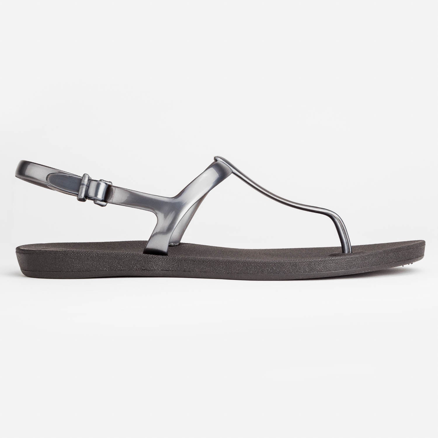 Sandals Journey designed by Third Oak metallic finish vegan cruelty free sturdy design made with bio based material 45% soy by weight 100% recyclable made in the USA eco friendly flats flip flops stylish shiny cute adjustable heel strap vacation good quality american made eco safe environmentally friendly best flats vacation open toe thongs good quality buy online clearance sale best materials durable good travel beach shoes dressy cute pretty elegant goes with shorts dress up or down good carry on stylish 
