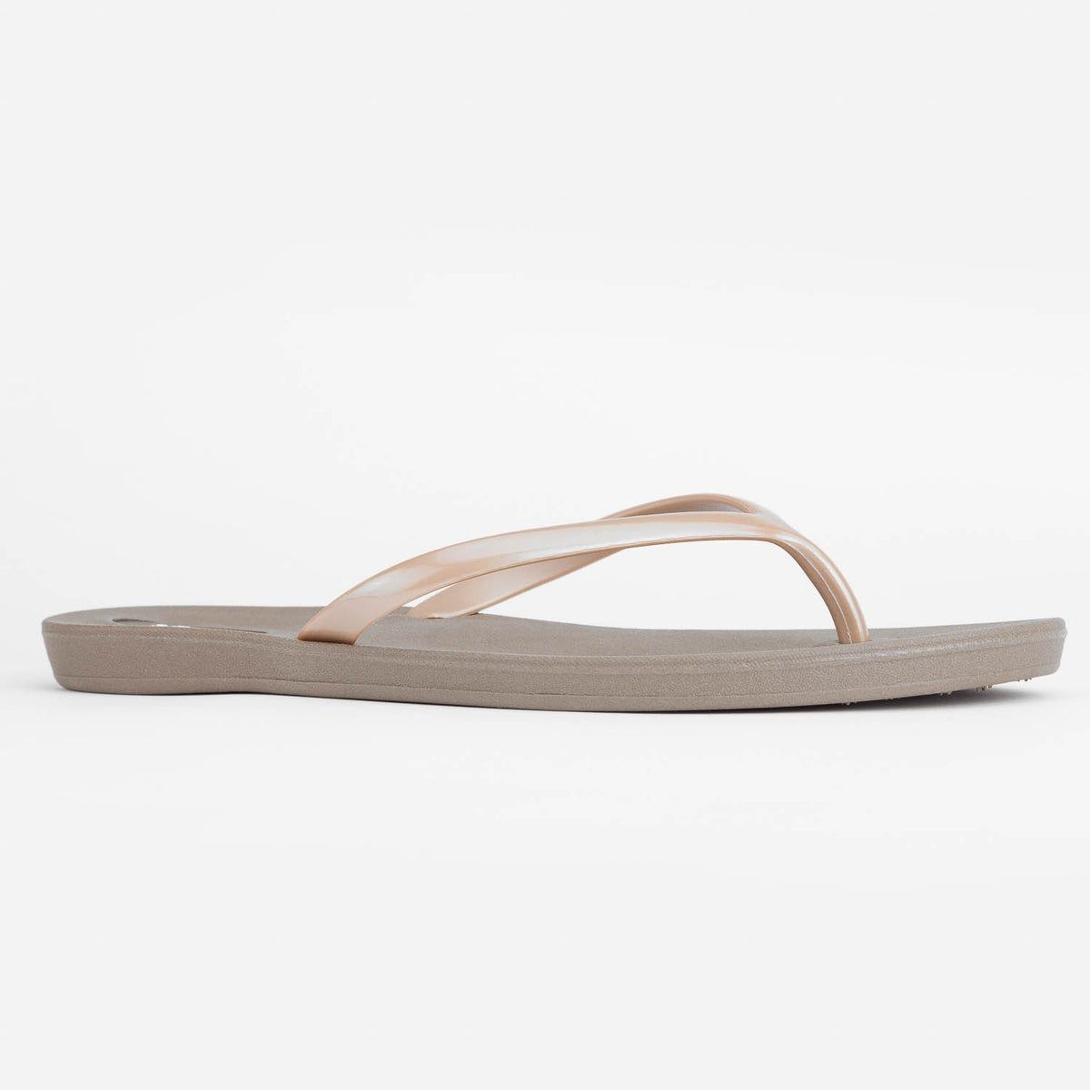 Sandals Scout Metallics Third Oak shimmer finish vegan cruelty free sturdy design made with bio based material 45% soy 100% recyclable made in the USA eco friendly flats flip flops stylish shiny cute great quality vacation good quality american made eco safe environmentally friendly best flats vacation open toe thongs good quality buy online clearance sale neutral color gold beige beach shoes dressy cute pretty elegant versatile dress up or down comfortable good travel carry on shimmer 