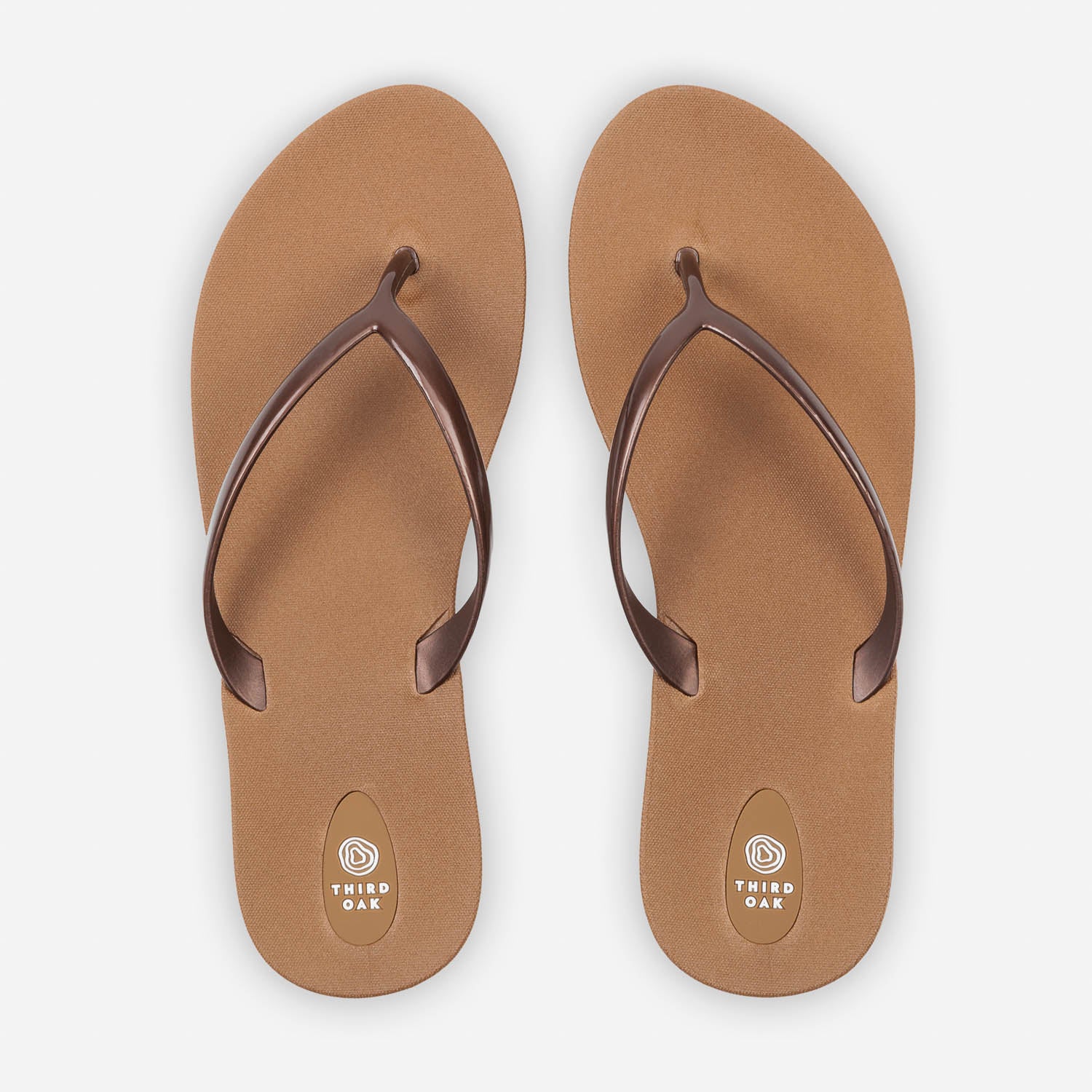 Sandals Scout Metallics Third Oak shimmer finish vegan cruelty free sturdy design made with bio based material 45% soy 100% recyclable made in the USA eco friendly flats flip flops stylish shiny cute clearance sale online vacation good quality american made eco safe environmentally friendly best flats vacation open toe thongs good quality buy online clearance sale neutral color bronze brown copper beach shoes dressy cute pretty elegant versatile dress up or down comfortable good travel carry on shimmer glos