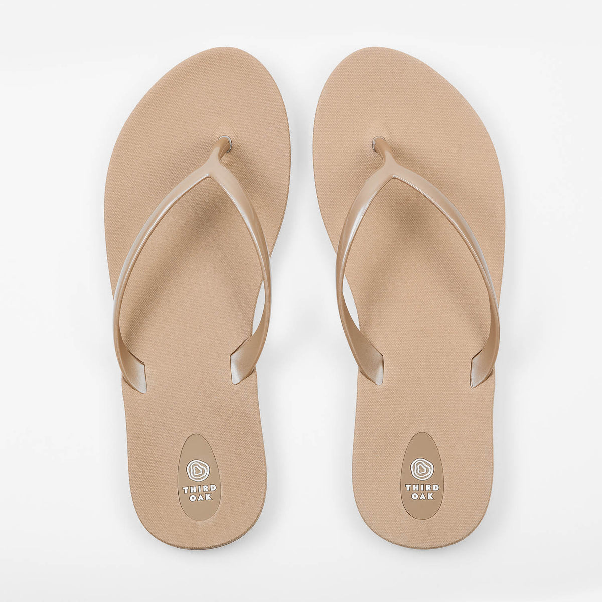Sandals Scout Metallics Third Oak shimmer finish vegan cruelty free sturdy design made with bio based material 45% soy 100% recyclable made in the USA eco friendly flats flip flops stylish shiny cute great quality vacation good quality american made eco safe environmentally friendly best flats vacation open toe thongs good quality buy online clearance sale neutral color gold beige beach shoes dressy cute pretty elegant versatile dress up or down comfortable good travel carry on shimmer 