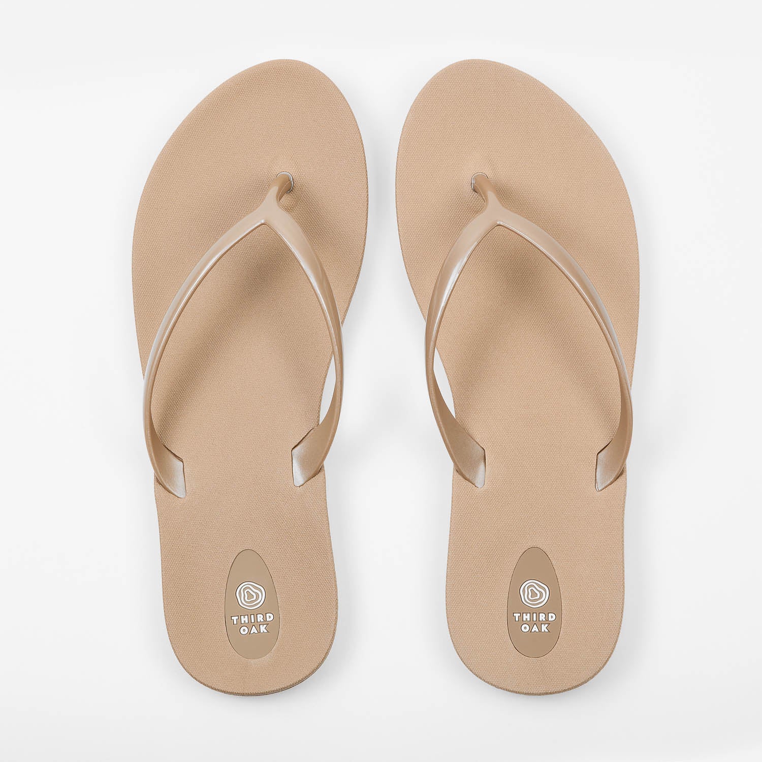 Sandals Scout Metallics Third Oak shimmer finish vegan cruelty free sturdy design made with bio based material 45% soy 100% recyclable made in the USA eco friendly flats flip flops stylish shiny cute great quality vacation good quality american made eco safe environmentally friendly best flats vacation open toe thongs good quality buy online clearance sale neutral color gold beige beach shoes dressy cute pretty elegant versatile dress up or down comfortable good travel carry on shimmer 