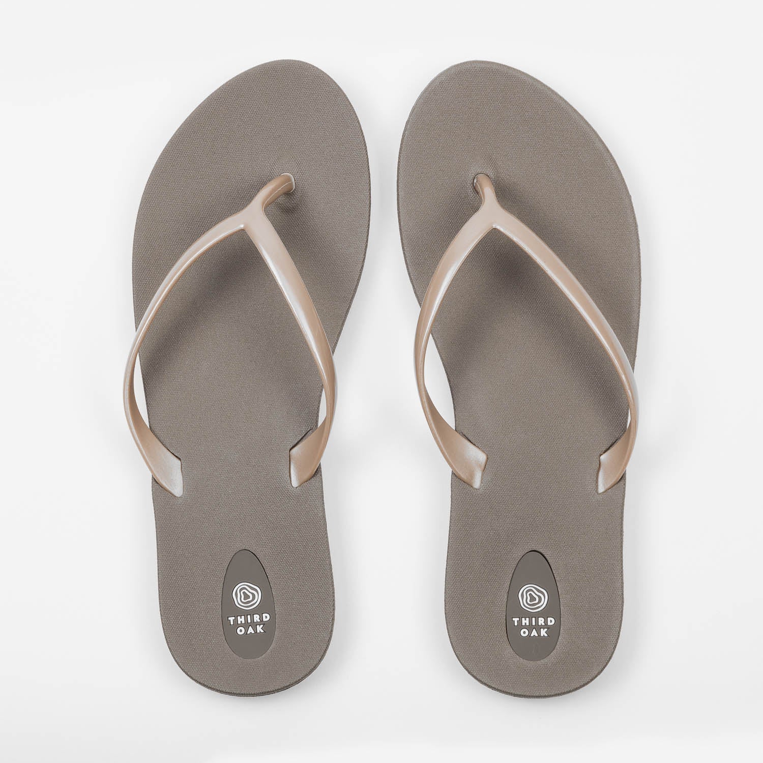 Sandals Scout Metallics Third Oak shimmer finish vegan cruelty free sturdy design made with bio based material 45% soy 100% recyclable made in the USA eco friendly flats flip flops stylish shiny cute great quality vacation good quality american made eco safe environmentally friendly best flats vacation open toe thongs good quality buy online clearance sale neutral color gold grey beach shoes dressy cute pretty elegant versatile dress up or down comfortable good travel carry on shimmer 