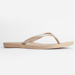 Sandals Scout Metallics Third Oak shimmer finish vegan cruelty free sturdy design made with bio based material 45% soy 100% recyclable made in the USA eco friendly flats flip flops stylish shiny cute great quality vacation good quality american made eco safe environmentally friendly best flats vacation open toe thongs good quality buy online clearance sale neutral color gold beige beach shoes dressy cute pretty elegant versatile dress up or down comfortable good travel carry on shimmer 