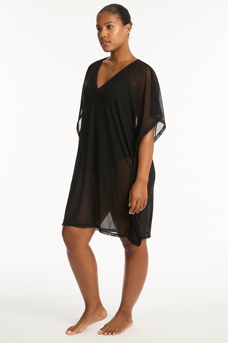 Tunic Beach Cover Up Sea Level Australia essentials beach dress short sleeve mid length knee length see through sheer mesh lightweight quick dry high end luxury designer online Canada USA pretty fancy beachwear website practical expensive durable good quality sexy pretty elegant fancy matches everything v neck mom woman over 40 vacation cottage Mexico tulum lake cute sophisticated fast shipping wealthy socialite savvy online shopper traveller fashionista short dress flattering bougie classy reputable store 