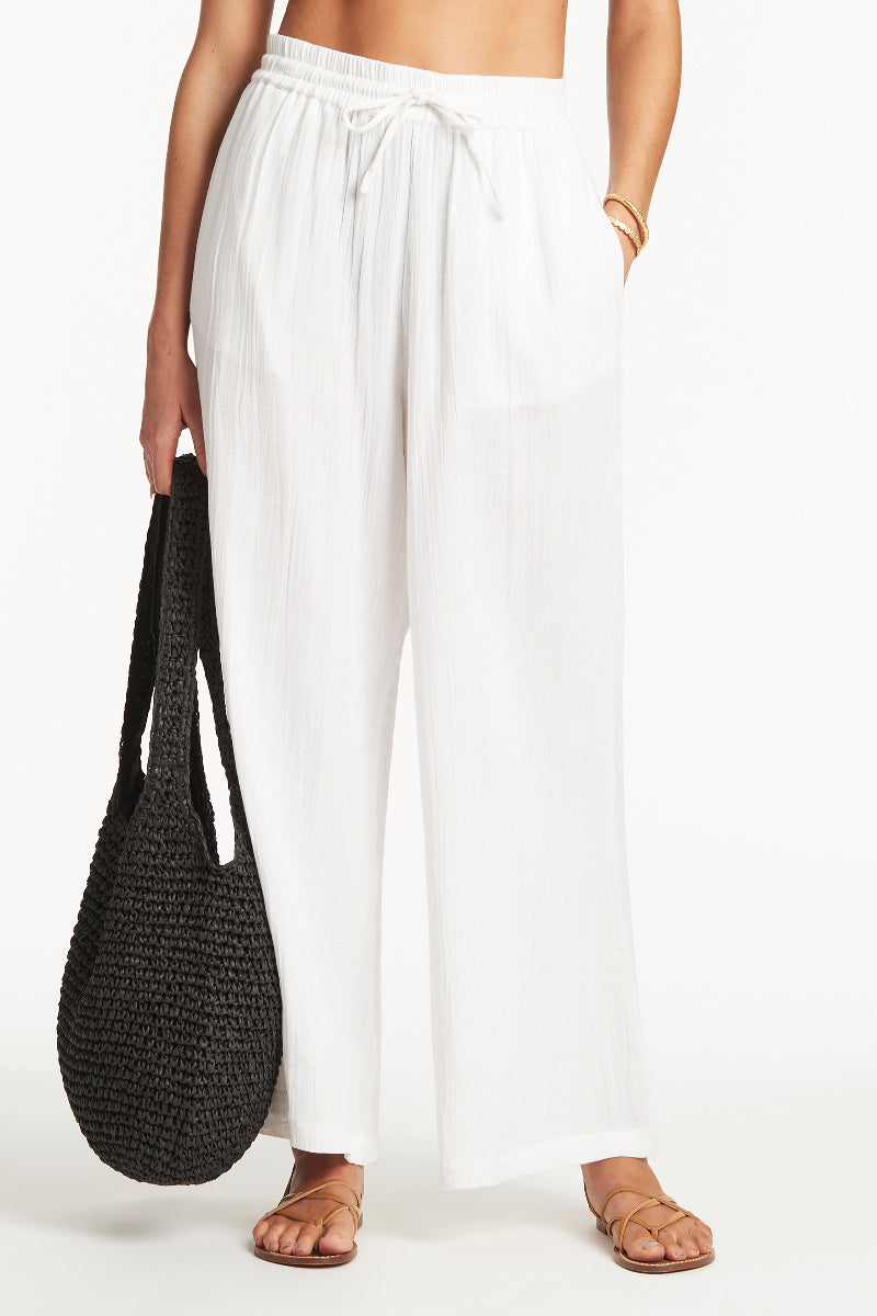 White Swimsuit Cover Up Pants Sea Level Australia sunset beach pants sexiest hottest luxury resort wear best quality classy sophisticated relaxed fit roomy oversized beachy flowy trendy casual wide leg pretty cool lightweight 100% cotton buy online expensive brand name designer quality luxury high end chic bougie influencer cancun trip best style goes with everything mom swim cover ups curvy elastic waistband long legs breezy glamorous beautiful smart sexy fancy chic bougie upscale popular big belly ladies 