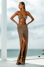 strapless luxury bronze bikini top with gold ring snake front removable straps and removable pads made in USA by Sauvage swimwear sold by retail online boutique sun vixen swimwear sunvixen.com. Purchase bronze bikini top with italian shimmer fabric online. shipped to customers in USA, Canada, Australia, France, Belgium, UK and Germany. Bought by customers & celebrities shopping for quality designer swimsuits for their high end vacation getaways to portofino, US virgin islands, maldives, and greek islands.