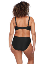 A plus size woman from Dallas wearing Mid Rise Tummy Control Bikini Bottoms Artesands on beach vacation to Majorca. She shopped her high quality slimming black full coverage bikini bottoms from sun vixen swimwear boutique website. Its a top rated retail womens swimwear store for stylish shoppers who like name brand good quality bathing suits, flattering swimsuits, tummy control bikini bottoms, best swimsuits for sagging breasts. Women from Detroit, Calgary, Hawaii, Philadelphia shop here for best beachwear