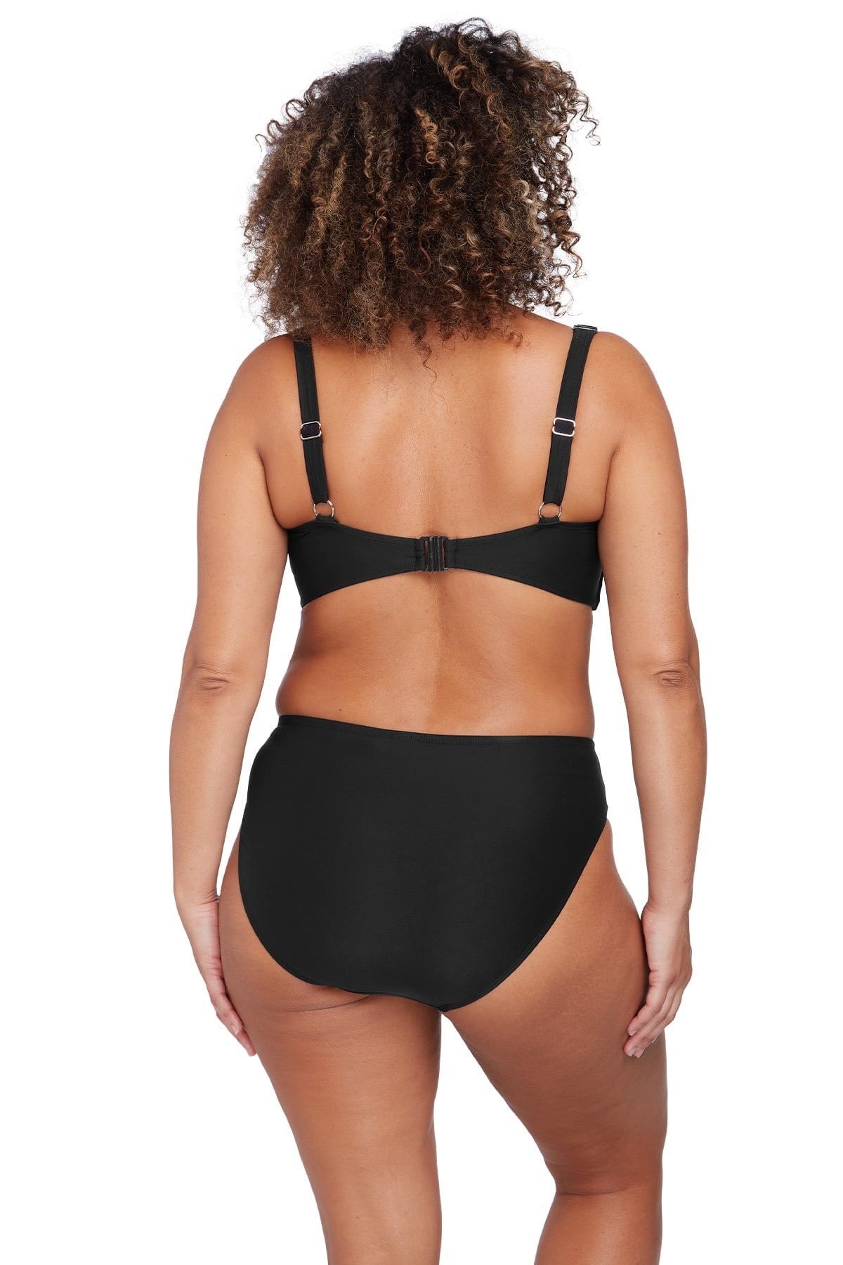 A plus size woman from Dallas wearing Mid Rise Tummy Control Bikini Bottoms Artesands on beach vacation to Majorca. She shopped her high quality slimming black full coverage bikini bottoms from sun vixen swimwear boutique website. Its a top rated retail womens swimwear store for stylish shoppers who like name brand good quality bathing suits, flattering swimsuits, tummy control bikini bottoms, best swimsuits for sagging breasts. Women from Detroit, Calgary, Hawaii, Philadelphia shop here for best beachwear