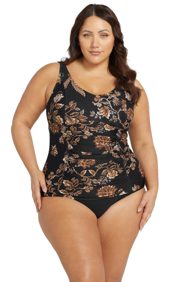 A high fashion big size woman from Toronto wearing Underwire Tummy Control Tankini Top Chantique Raphael E/F Artesands on beach vacation to Tulum. She bought her glamorous slimming tankini from sun vixen swimwear boutique website. Its a no.1 womens swimwear retail store for travel enthusiasts and fashionistas who like good quality swimwear, supportive swimsuits, tummy control bikinis, best swimsuits for apple shape. Women from Louisville, Memphis, Detroit, Washington frequently shop for luxury swimsuits 