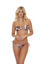 A woman from New York USA is wearing a cougar ring bandeau bikini top with teeny bikini bottoms pq swim designer swimwear leopard print strapless bikini top best quality cheeky animal print bikini bottoms she purchased online from sun vixen swimwear usa canada. order online bold flashy swimsuits Tulum Mexico sexy bikini skimpy bikini bottoms. She also bought luxury bikinis, high end beach cover ups, sheeky bikini bottoms, glamorous bathing suits from this boutique swimwear for her lavish tropical vacation 
