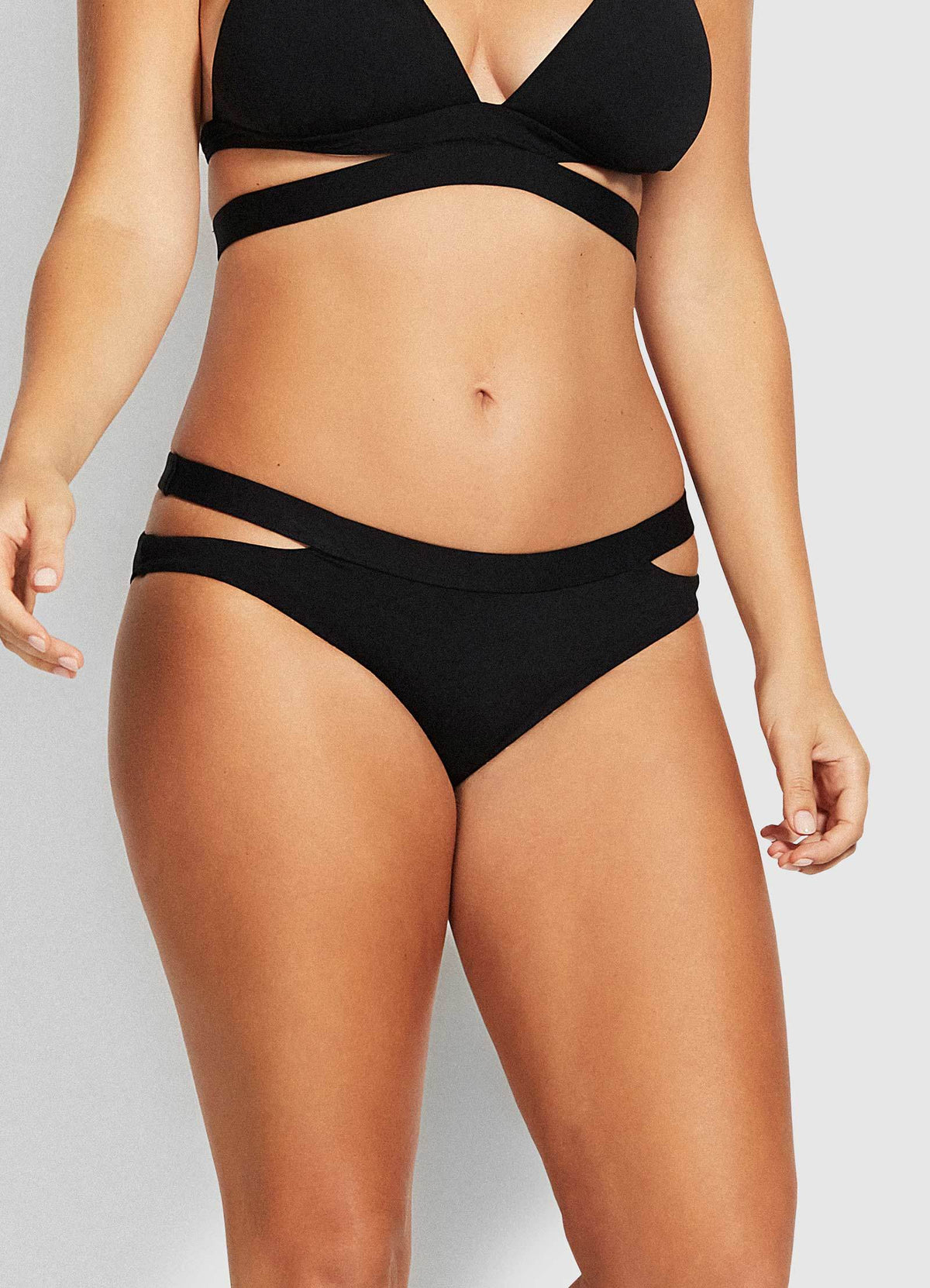 hipster bikini bottoms black seafolly canada low rise cutout edgy stylish sexy full coverage glamorous designer unique hot swim bottoms luxury fashionista online shopping enthusiast buys online frequently travels beach resort often pool party bikini sophisticated stylish strappy bikini set rocker glam edgy vibe high end luxury swimwear online LA NY