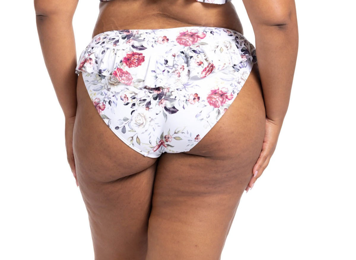 A plus size woman from Toronto Canada purchased a flounce tummy control bikini artesands online from sun vixen swimwear a luxury boutique website in USA Canada and worldwide that sells brand name plus size swimwear for women who buy good quality bathing suits for her luxury vacations in Cancun Mexico. She frequently shops for best tummy control swimsuits, sexy tummy control bikinis, slimming swimsuits, shapewear bathing suits, tummy control tankinis, slimming one piece swimsuits from this top rated store