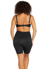 A stylish woman from Seattle is spending her birthday in Hawaii wearing the Artesands Michelangelo knee length swim bike shorts, sustainable luxury swim bottom loved for its tummy control, high end compression, good quality designer construction, and sophisticated fashionable resort look. She purchased them from Sun Vixen Swimwear for active beach travel, long ocean swims. Women across Calgary, Toronto, Los Angeles, Miami, and the USA search for these shorts when they want best quality resort shorts online