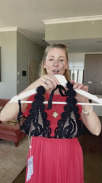 black lace bikini top black scalloped bikini midnight pq swim sexy best triangle bikini top high end best quality classy hot bikinis. an elegant middle aged mom who loves to travel and go on her beach vacation is wearing a stunning high end black bikini on her trip to greece. She purchased her sexy bikini online from sun vixen swimwear a boutique website that is intended to sell to luxury shoppers who like on trend fashionable bathing suits to look sexy in a swimsuit. Its a top rated swimwear website online