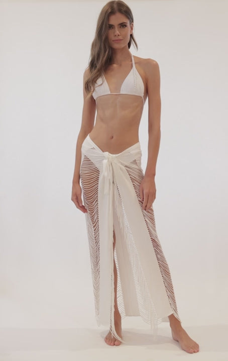 Fringe Sarong Convertible Dress PQ Swim White Monique Sarong White fringe sarong skirt convertible wrap beach dress cover up PQ Swim Midnight Monique Cover Up bikini cover up tassel sarong skirt sexiest hottest luxury best quality classy designer best high quality flattering luxe fashion high end resort wear canada glamorous stylish fancy sheer pareo exquisite upscale sophisticated bathing suit cover ups exotic unique hot smart and sexy elegant beautiful upscale fashionable luxurious popular beach cover ups